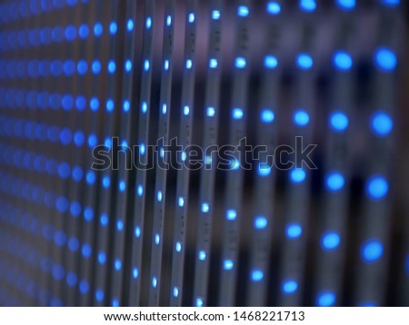 Transparent RGB smd LED Stripes. Vertical lines with blue lights. Perspective View blurry