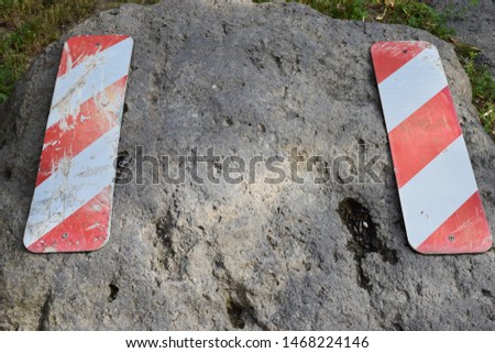 reflector pads on a rock