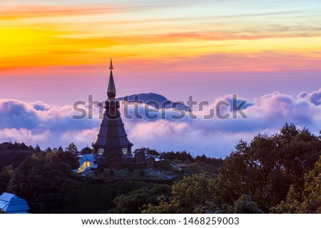 Landscape of two pagoda (noppha methanidon-noppha phon phum siri stupa) 
in sunrise time with mist in the backgroundat at Inthanon mountain, chiang mai, Thailand Royalty-Free Stock Photo #1468259003