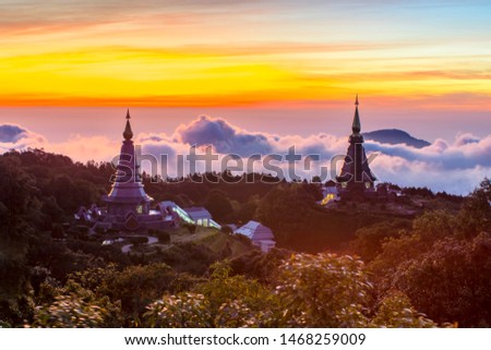Landscape of two pagoda (noppha methanidon-noppha phon phum siri stupa) 
in sunrise time with mist in the backgroundat at Inthanon mountain, chiang mai, Thailand Royalty-Free Stock Photo #1468259009