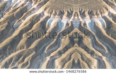 The symmetry of an artificially made from the folds of rocks