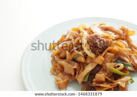 Chinese food, beef and rice noodles stir fried Chow Fun Royalty-Free Stock Photo #1468331879