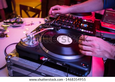Disco DJ play LP on party