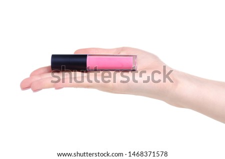 Pink lip gloss in hand beauty on white background isolation