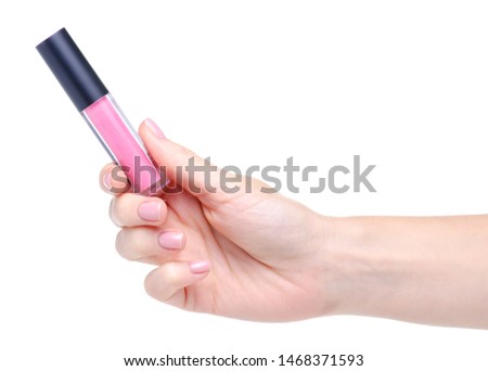 Pink lip gloss in hand beauty on white background isolation
