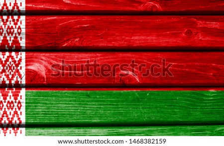 Belarus flag painted on wooden background, closeup.
