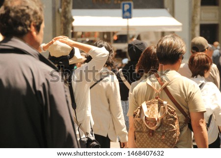 People walking in a street from Barcelona