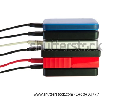 Stack of portable external hard disk drive isolated on white background