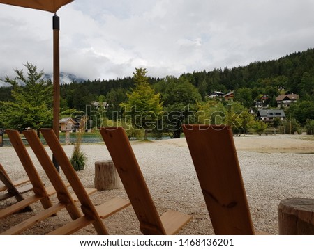 Lake Jasna in Kranjska Gora Slovenia. Chairs in the bar with a view. Picture was taken on 14th of August 2018.