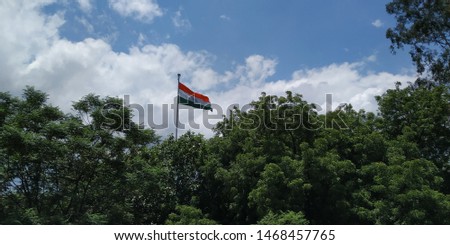 Indian tricolor flag with cloudy background