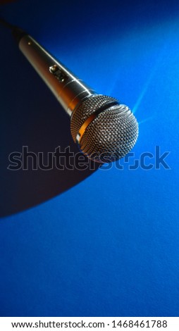 studio microphone , color background . closeup                             