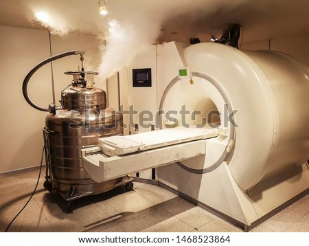 Adding helium to a mri scanner Royalty-Free Stock Photo #1468523864