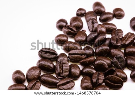 Dark Coffee beans. Isolated vintage style. Brown roasted coffee beans, seed on dark background. Espresso dark, aroma, black caffeine drink. Closeup isolated energy mocha, cappuccino ingredient.