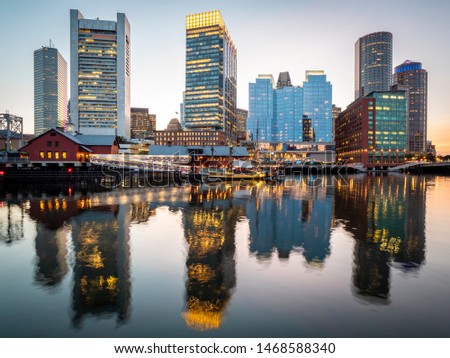 Panoramic view of Boston In Massachusetts, USA at sunset showcasing its Financial District at Seaport Boulevard.