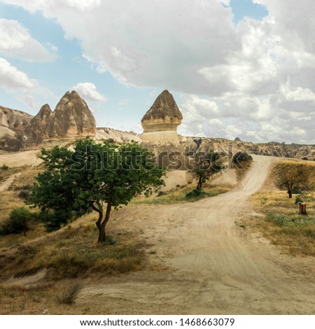 Spectacular rock formations in Meskendir Valley, near Goreme in Kapadokuya, Turkey