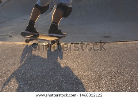 Skateboarder getting ready to drop