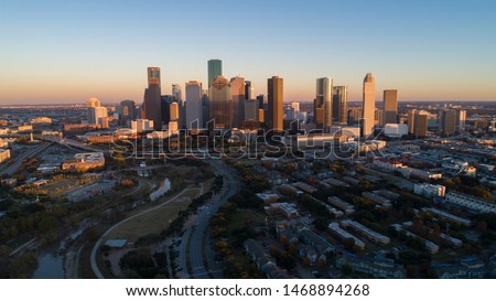 Aerial view of down town Houston building, Texas, United States in the afternoon, golden hour, during sunset