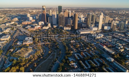 Aerial view of down town Houston building, Texas, United States in the afternoon, golden hour, during sunset