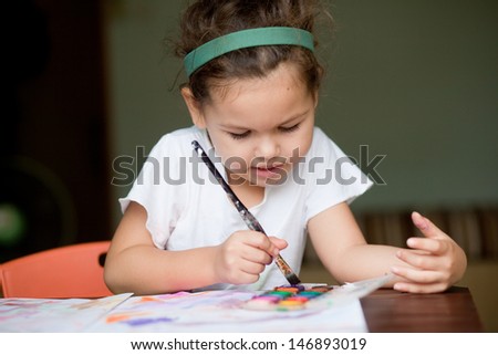 A child draws a picture