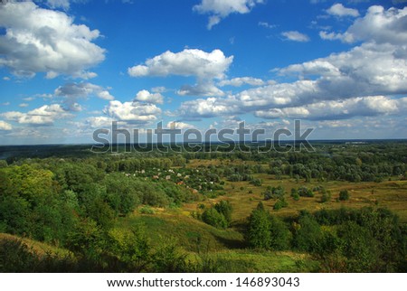 Beautiful hill valley with clouds 