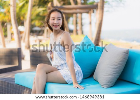 Portrait beautiful young asian woman happy smile relax around neary beach and sea for leisure travel and vaction