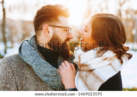 Photo of handsome couple, enjoying time together, walking time, winter
