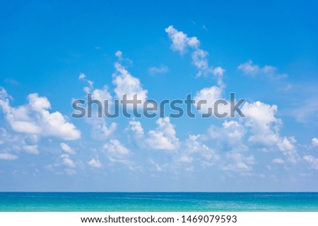 Blue sky Cut with white clouds The horizon with the blue sea on a bright day