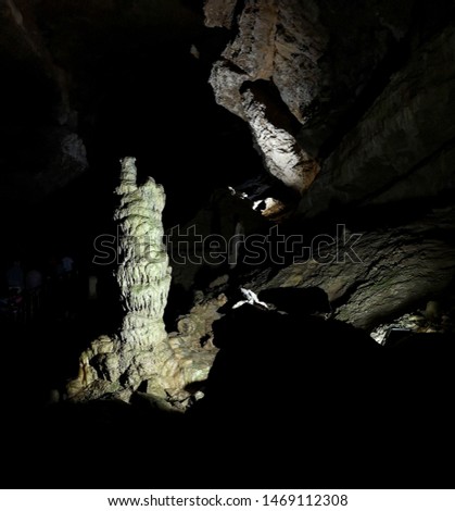 Stalactites in the cave as background .