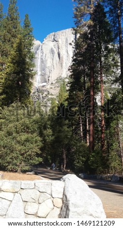 Yosemite National Forest trail and waterfall.