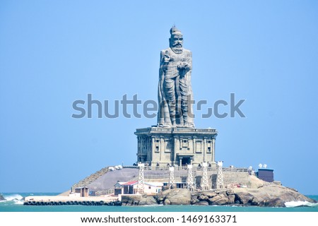 The Thiruvalluvar Statue, or the Valluvar Statue, is a 133-feet (40.6 m) tall stone sculpture of the Tamil poet and philosopher Valluvar, author of the Tirukkural, Kanyakumari, Tamilanadu India Royalty-Free Stock Photo #1469163371
