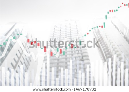 Abstract blurred background, Double exposure of Stock market graph in modern skyscraper, candle stick chart with white color background, concept for stock trading and financial markets