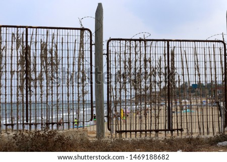 fence in a park on the shores of the Mediterranean
