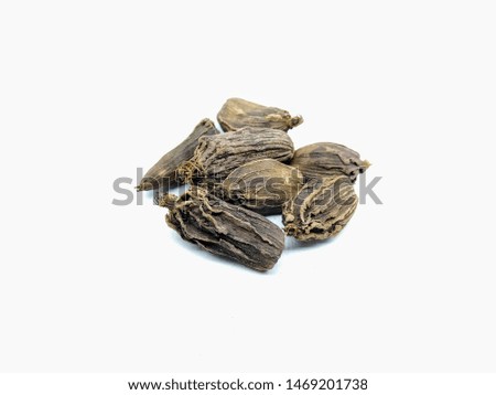 A picture of black cardamoms isolated on a white background