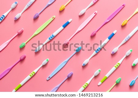Top view of toothbrushes in colorful on pastel color background.
 Royalty-Free Stock Photo #1469213216
