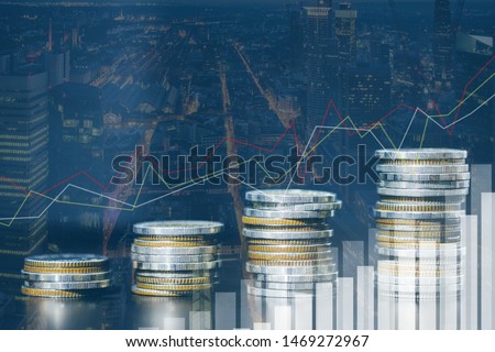 Double exposure of city and rows of coins for money, finance and business concept of teamwork and partnership. ECN Digital economy, best, passive income. Royalty-Free Stock Photo #1469272967