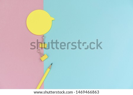 School stationery on a pink and blue background. Back to school creative background, template. Creative, fashionable, minimalistic, office workspace with supplies on pink-blue background. Flat lay.