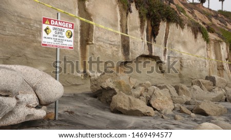 Warning sign at the site of a deadly bluff collapse on Grandview Beach, Encinitas                               
