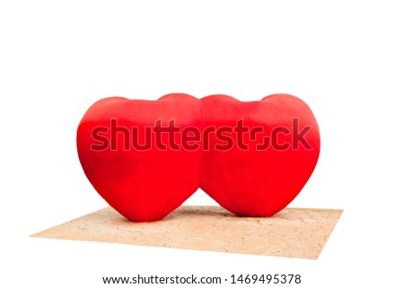 Heart sculpture made of cement and have color red is symbol of love and fresh on white background.