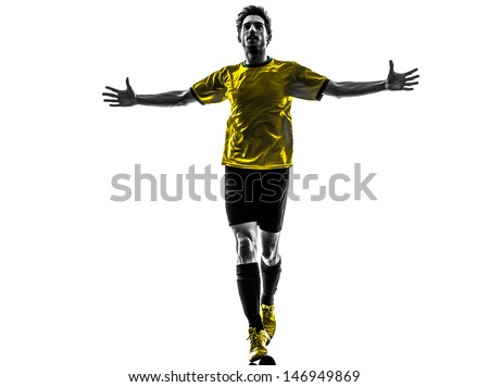 one brazilian soccer football player young man happiness joy  in silhouette studio  on white background