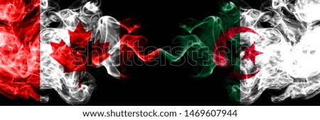 Canada vs Algeria, Algerian smoky mystic flags placed side by side. Thick colored silky smoke flags of Canadian and Algeria, Algerian