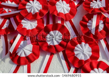 Many badges in the colors of the Polish flag: white-red Royalty-Free Stock Photo #1469680955