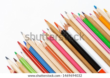 Wooden color pencils on white background