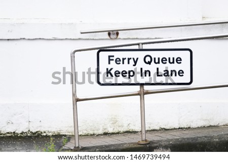 Ferry queue keep in lane sign at Largs Scotland UK