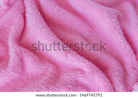Texture fabric. Textile pink knitted cloth background.