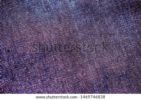 Denim blue jeans texture. Close-up blue jeans pattern.