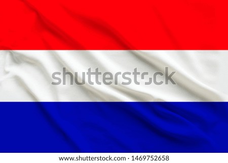 national flag of Holland, a symbol of tourism, immigration, political asylum