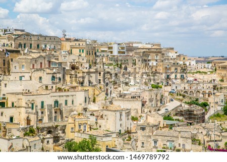 Detail of the houses of Matera with the church of San Pietro Barisano
