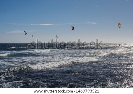 Aerial view of Kitesurfing on the waves of the sea. Kitesurfing, Kiteboarding action photos