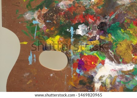 Colorful paints on the palette