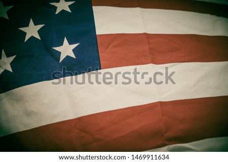 Close up America flag waving with the wind for memorial day. National symbol concept.